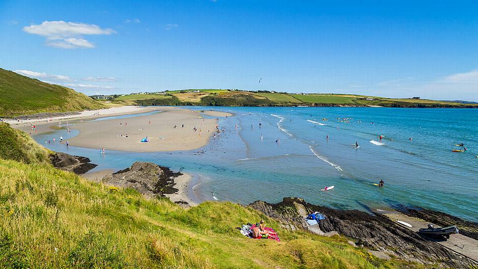 Riptide warning for swimmers as four are rescued Image