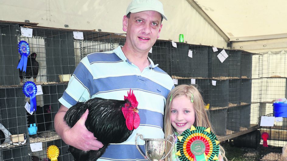 At the show were Brendan and Abi Ross with their champion bird of the show and the 
Linda Kingston Memorial Cup.                       (Photo: Donie Hurley)