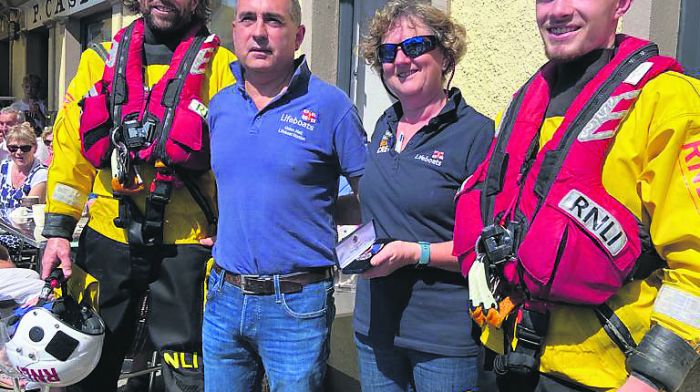 Mary Jacinta Casey received a long service medal from the RNLI for 25 years of fundraising for the organisation which was presented by John Kelleher, Union Hall RNLI lifeboat operations manager. Also included are crew members Hugh McNulty and Stuart Fuller. The presentation took place at a coffee morning organised by the Casey family last Sunday morning