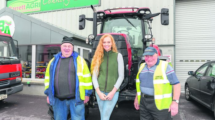 Ger Coughlan from Newcestown with Sandy French, Lissarda, and Denis Lordan from Coppeen, who took part in the Bengour Harvest Festival tractor and car run which took place in Coppeen last weekend in aid of Marymount Hospice, Cork University Hospital and Breakthrough Cancer Research. 				                  (Photo: David Patterson)