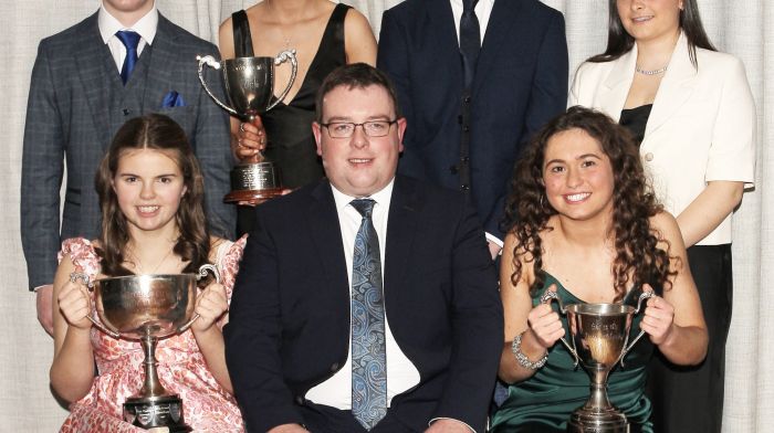 Tomás Ó Muirí (seated centre), chairman of Coiste Náisiúnta Scór is pictured with the St James' team that won the All-Ireland Scór na nÓg. Also seated are Niamh McCarthy (left) and Cáit O'Mahony. Back from left, Joseph O'Sullivan, Laura Hodnett, Conor Whelton and Orla Whelton.