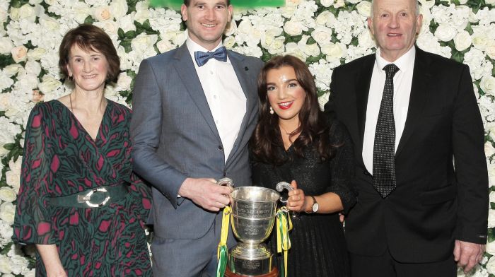 Tadhg Feen and Donna Moloney with the Mick McCarthy Cup, and Tadhg's parents Michelle and Tim.
