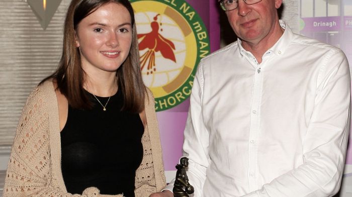 Donal McCarthy, Drinagh Co-op Chairman, presents the U16A Drinagh Co-op Player of the Match Award to Maebh Collins, Ilen Rovers.