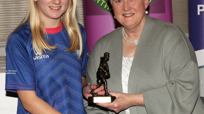 Claire Linehan, Valley Rovers, receives the U14C2 Drinagh Co-op Player of the Match award from Marian Crowley, Cork LGFA Treasurer.