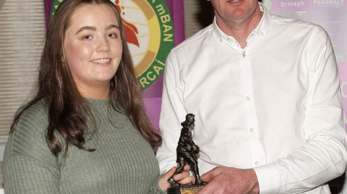 Shona Cronin, Valley Rovers, receives the U16B Drinagh Co-op Player of the Match award from Donal McCarthy, Drinagh Co-op.