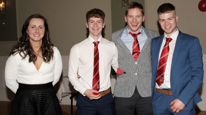 Colm O'Brien, David Walsh and Ruairi O'Brien received their 2022 South West JAHC medals from Martina O'Brien.
