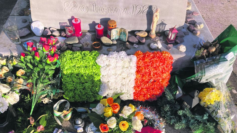 Collins monument is attracting array of trinkets and even stones Image