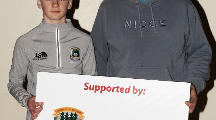 Conor Downing of Caha Óg pictured with his father Joe.