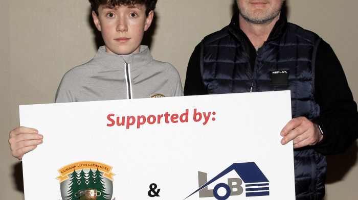 Aodh Whooley of Ilen Rovers GAA Club pictured with his father Jason.