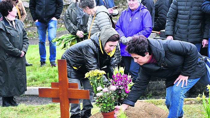 Yevhen’s friends visit grave to say their goodbyes Image