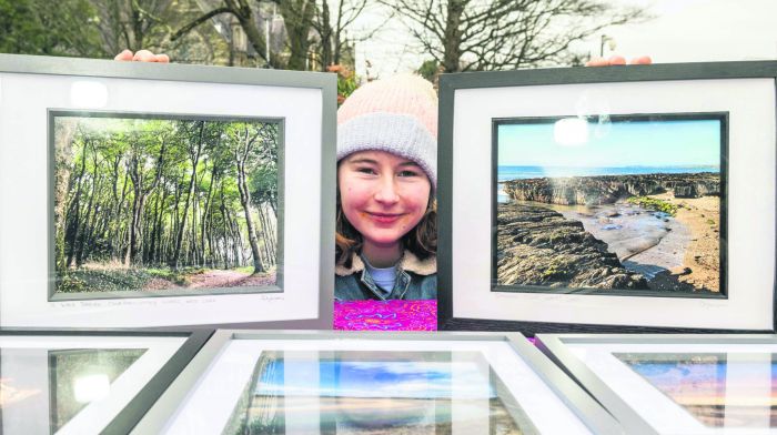Shanon O’Gorman from Clonakilty selling her photographs at the Friday market in the town. (Photo: Andy Gibson)