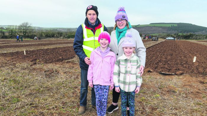Kevin and Clare O’Sullivan from Kilmalooda with daughters Grace and Olivia at the Clogagh ploughing.