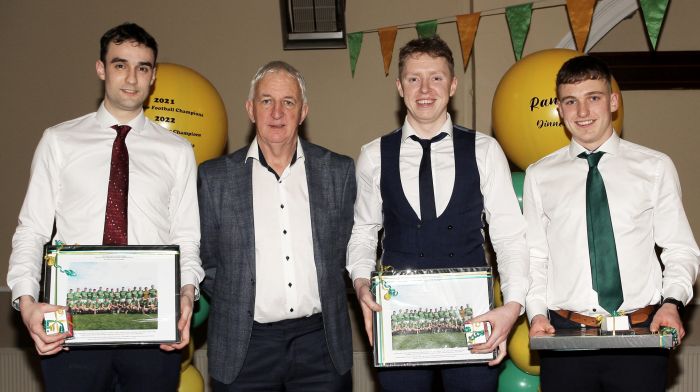 Project Co-Ordinator Cork Football, Conor Counihan, presenting medals to Peter Collins, Séadna Crowley and Kevin Dullea.