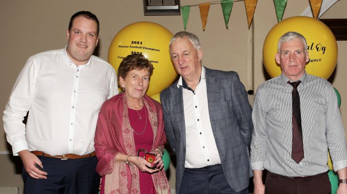 Project Co-Ordinator Cork Football, Conor Counihan, presenting medals to Aidan O'Sullivan, Margaret O'Donovan and Johnny Collins.