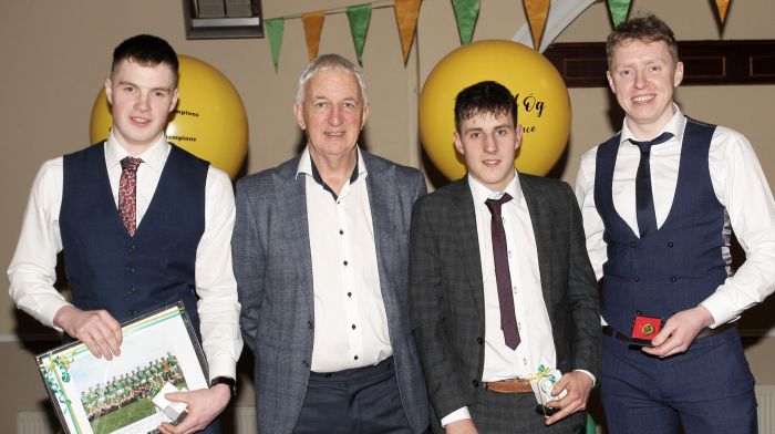 Project Co-Ordinator Cork Football, Conor Counihan, presenting medals to Barry O'Sullivan, Padraig Duggan and Séadhna Crowley