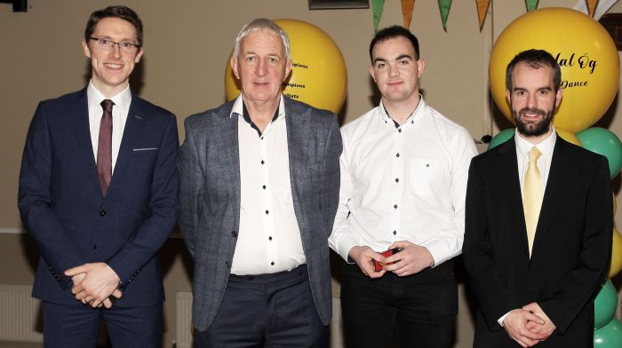 Project Co-Ordinator Cork Football, Conor Counihan, presenting medals to Patrick Crowley, Barry Lynch and Alan Buckley.