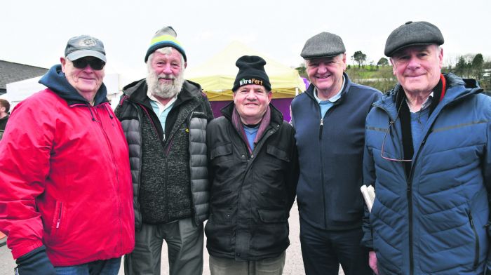 At Skibbereen Farmers Market last Saturday afternoon were local men Gerald O'Brien, Donnchadha Ó hAodha, John McDonald, Peter Walley and Eamonn Nealon. Right: Supporting a tractor run in Ahiohill for Drimoleague and Bandon food banks were Liam Suipéal and his grandaughter Cara and her mum and dad Conor and Caoimhe O'Driscoll. (Photos: Anne Minihane & Denis Boyle)