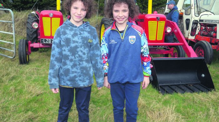 At a recent tractor run in Ahiohill  in aid of Feed West Cork Food Banks in Drimoleague and Bandon were twins Jack and Declan Corcoran from Crookstown.	                      (Photo: Denis Boyle)