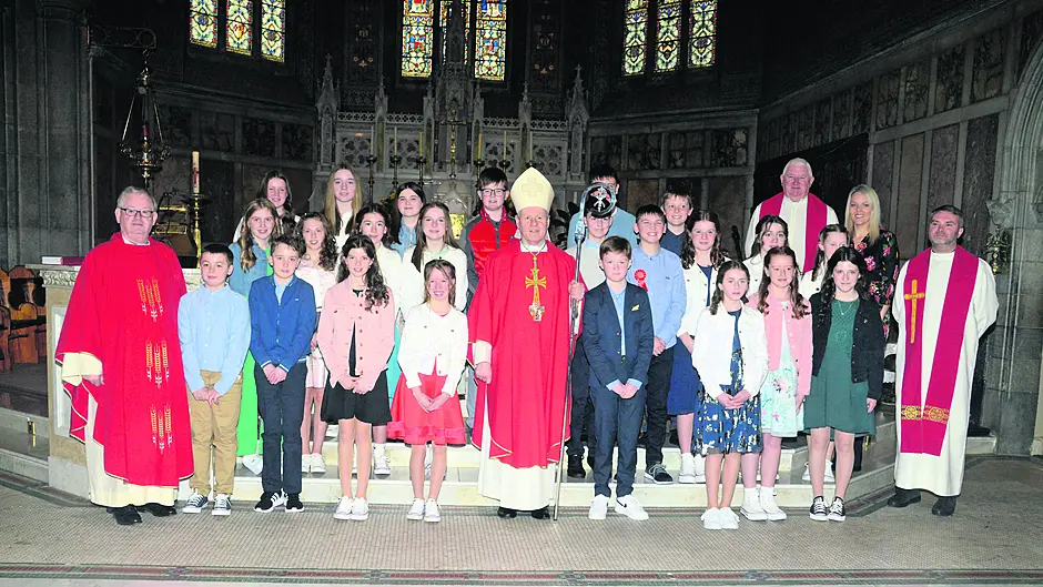 Bishop of Cork and Ross Dr Fintan Gavin with students of Laragh NS on their confirmation day in Bandon church. 			               (Photo: Denis Boyle)