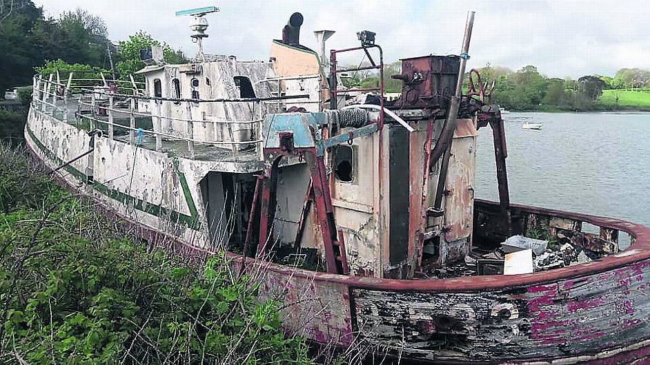 Abandoned Kinsale trawler is dragging down quay wall Image