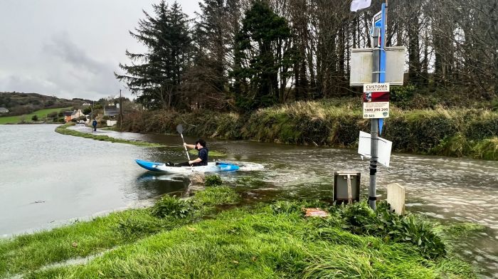 Tidal flooding in West Cork as one man kayaks for a coffee Image