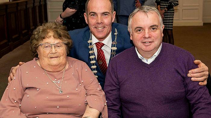 Cllr Declan Hurley with award winner Kitty Cotter from Enniskeane, with her son Liam.