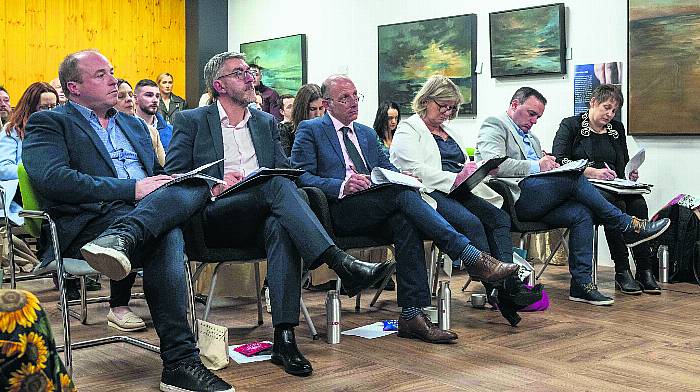 The judges listening intently to a pitch at Tuesday night's event. (All photos: Andy Gibson)