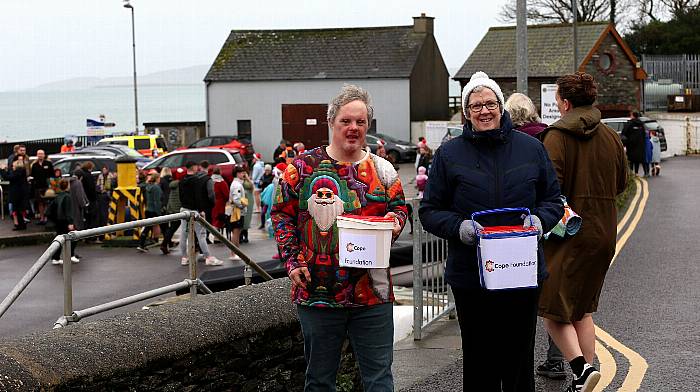 Finnin Mc Carthy and Breda Lynch collecting in aid of  Cope Foundation at the annual Christmas Day Swim in Schull.(Photo: Carlos Benlayo)