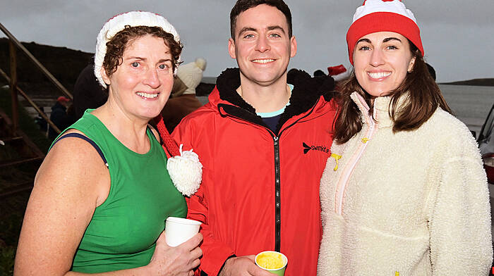 Cait O’Sullivan, Clonakilty (left) with John and Emma O’Donovan, Courtmacsherry pictured after they participated in the Christmas Day swim at Broadstrand, Courtmacsherry. Proceeds from the fundraising swim were divided equally between COPE in Clonakilty and the Paediatric Cystic Fibrosis Unit at the Cork University Hospital. (Photo: Martin Walsh)