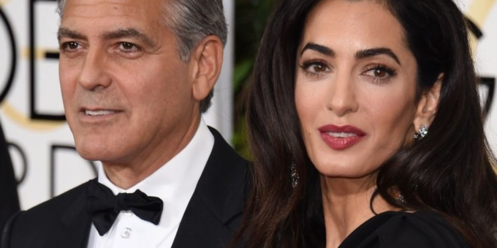 George And Amal Clooney Welcom...