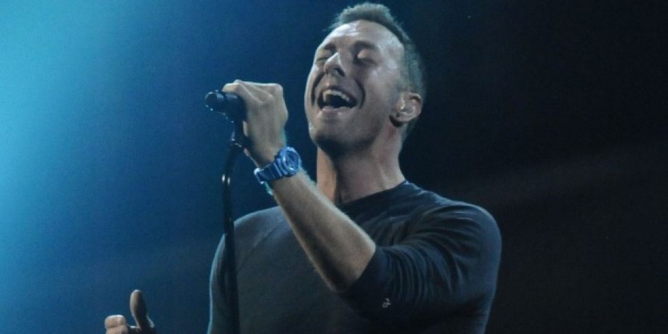 Chris Martin Plays Touching Tr...