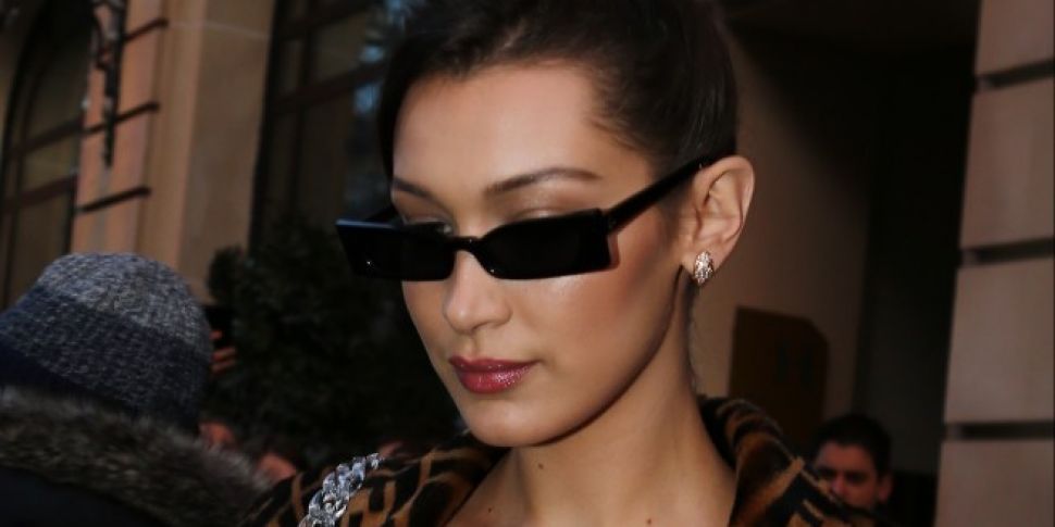 Bella Hadid Denies Kissing The...