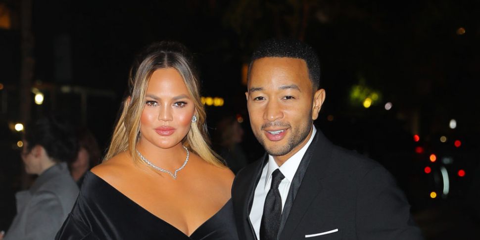 John Legend Moves Chrissy Teig...