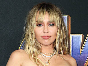 Miley Cyrus Kisses Shirtless TikToker King Moxu In Bizarre New Video ...