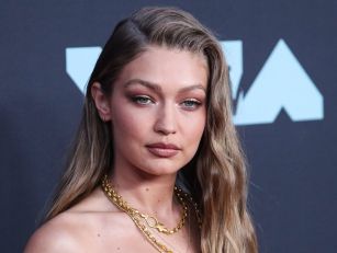 Gigi Hadid intercepts runway intruder during Chanel's Paris Fashion Week  show