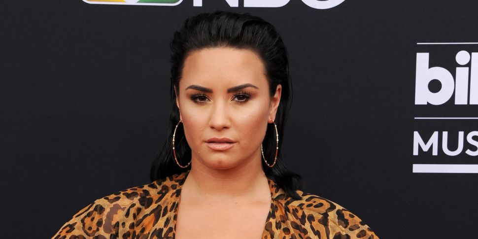 Demi Lovato shows off new piercing next to spider head tattoo