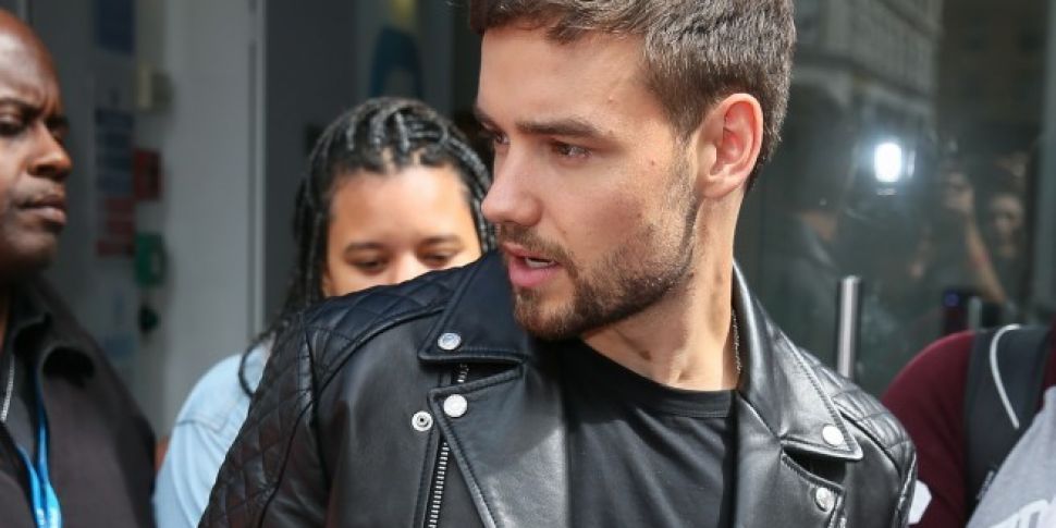 Liam Payne Cosies Up To Model...