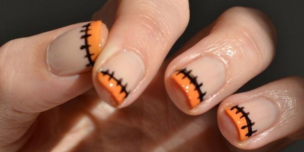 5. "Fun and Festive Halloween Nail Designs for Short Nails" - wide 4