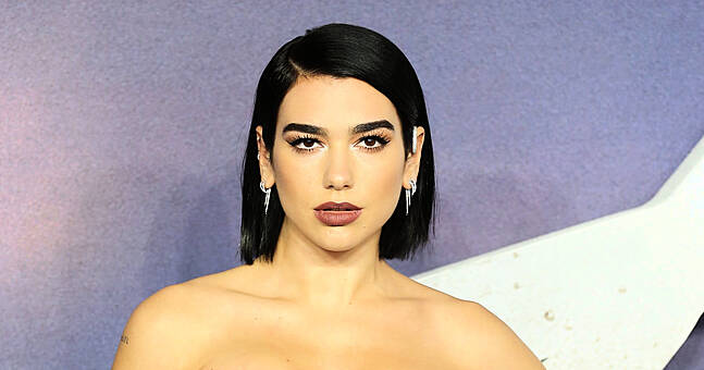 WATCH: Dua Lipa Responds To Speculation She's Pregnant | SPINSouthWest