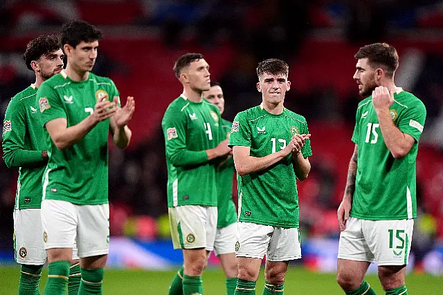 Republic of Ireland players applaud the fans after the defeat for England