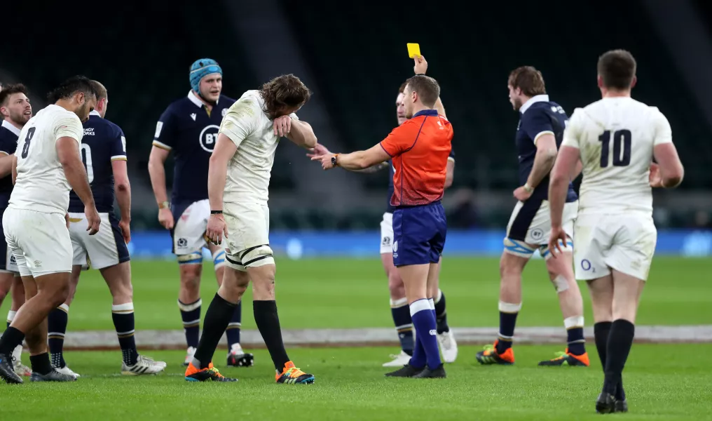 Billy Vunipola, left, is shown a yellow card by referee Andrew Brace