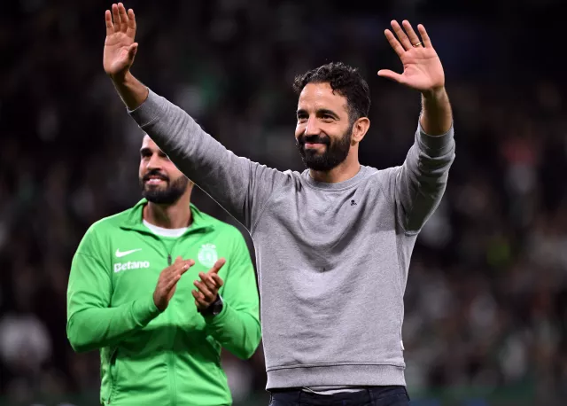 Sporting Lisbon bosss Ruben Amorim waves to the fans after victory over Manchester City