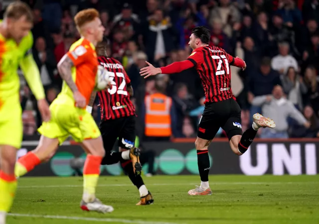 Kieffer Moore (right) celebrates