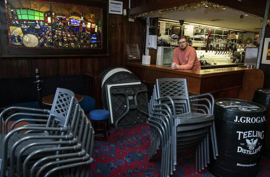 Daniel Smith, bartender and son of one of the co-owners of Grogan’s Castle Lounge, at the premises in Dublin’s city centre (Brian Lawless/PA)