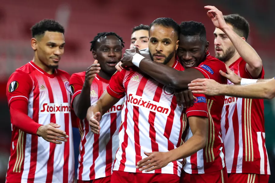 Youssef El-Arabi (centre) drew Olympiacos level 