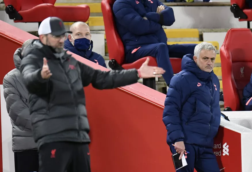 Liverpool manager Jurgen Klopp, left, with Spurs boss Jose Mourinho 