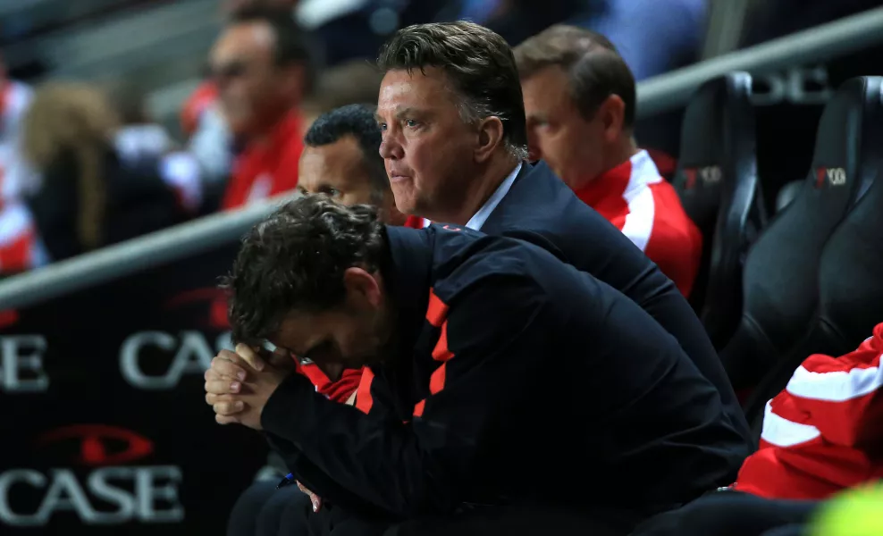 Louis van Gaal shows his dejection during defeat to MK Dons