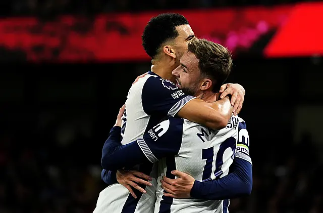 James Maddison, right, celebrates his second goal with Tottenham team-mate Dominic Solanke