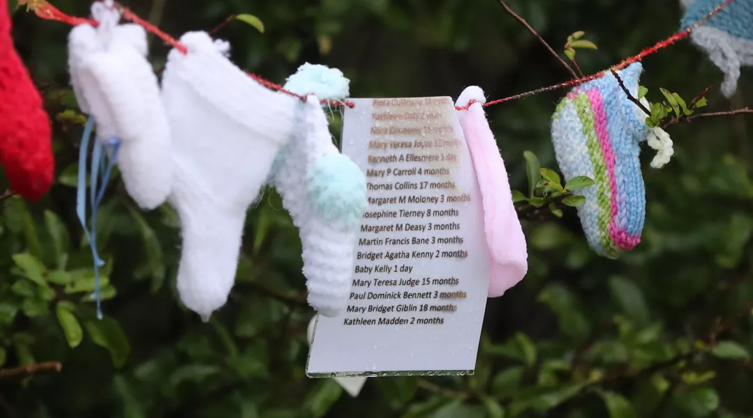 Lists of the names of dead children at the grotto on an unmarked mass grave at the site of the Tuam mother and baby home 