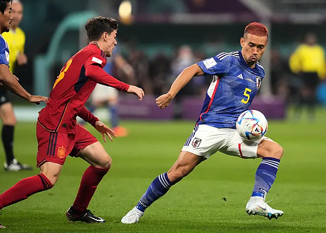 Yuto Nagatomo (right) in action for Japan in their win against Spain (Martin Rickett/PA).